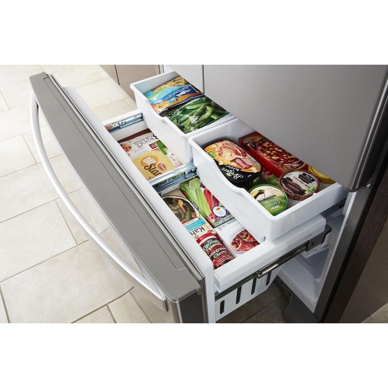 whirlpool gold refrigerator ice in bottom of freezer