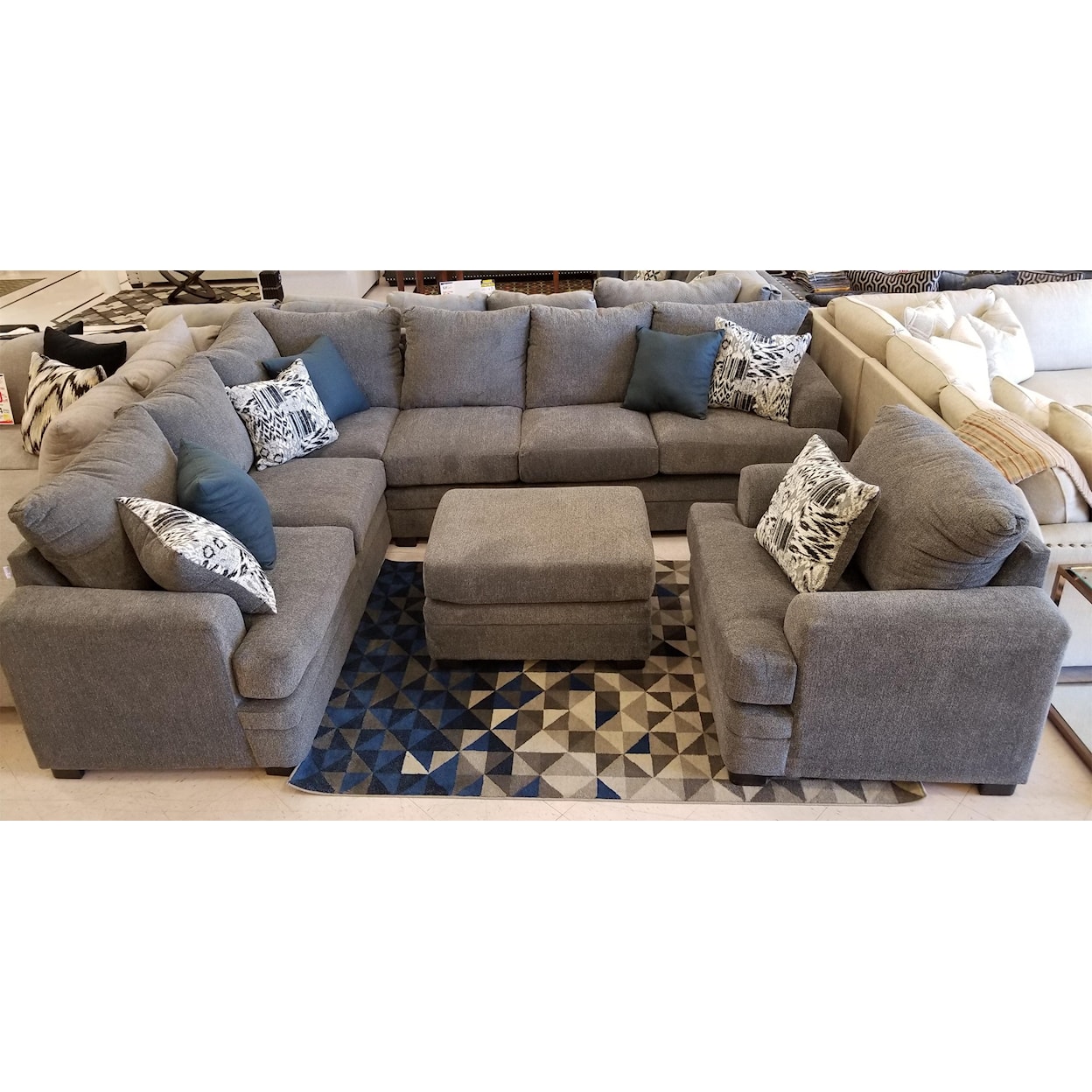 Exclusive Sorrento Sectional plus Chair and Ottoman