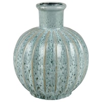 The earthenware Olmedo Small Vase brings texture with a pop of color
