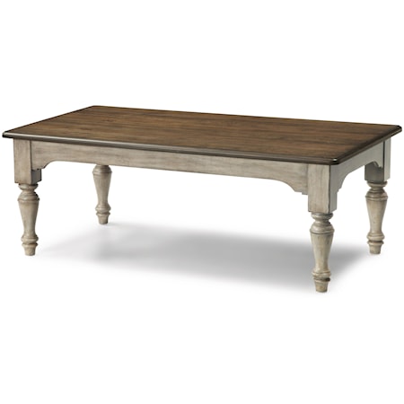 Relaxed Vintage Rectangular Cocktail Table with Turned Legs
