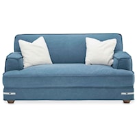 Contemporary Loveseat with Exposed Wood Feet and Two Pillows