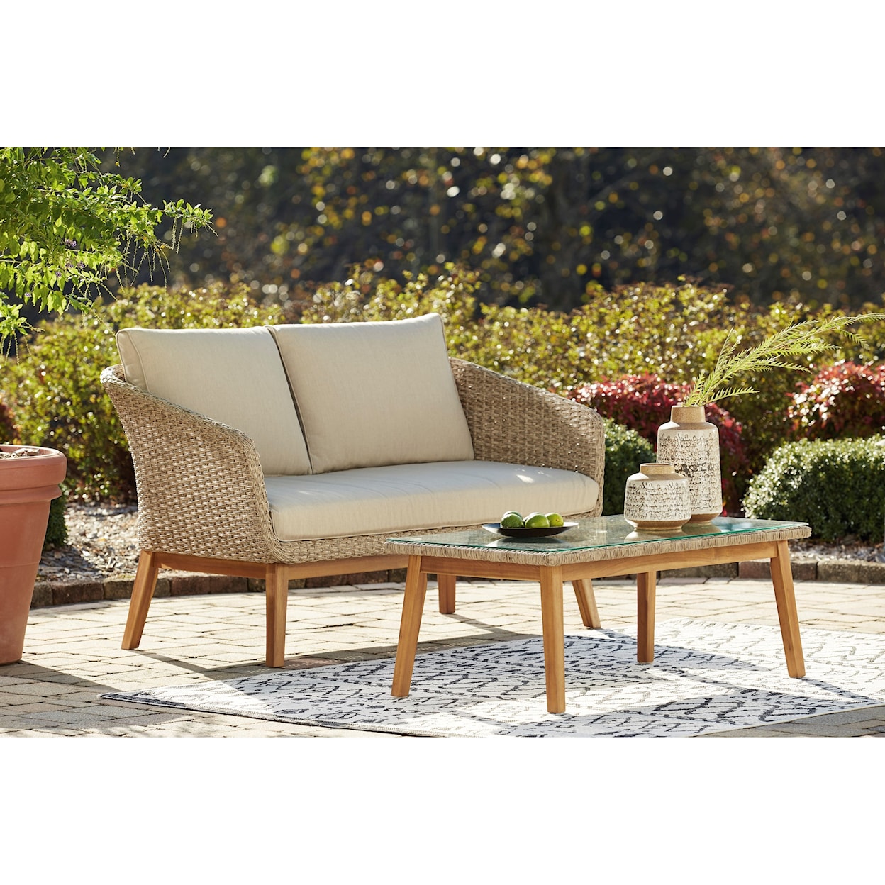 Signature Design by Ashley Crystal Cave Loveseat w/ Table