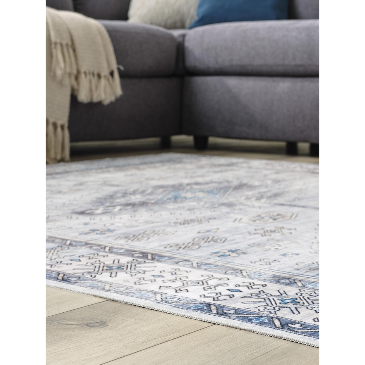 Signature Design by Ashley Machine Washable Rugs Hebruns 5' x 7' Rug