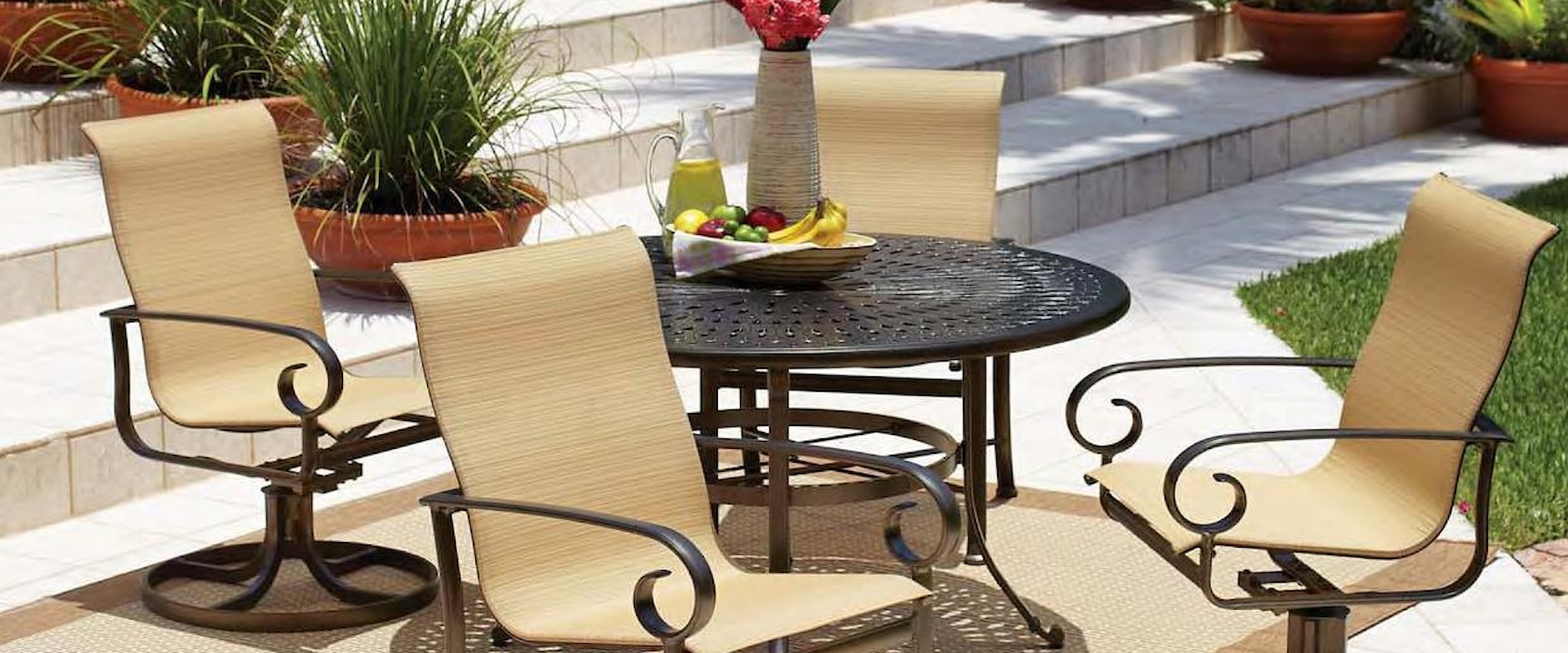 Five Piece Outdoor Dining Set with Cast Iron Table and Sling Chairs