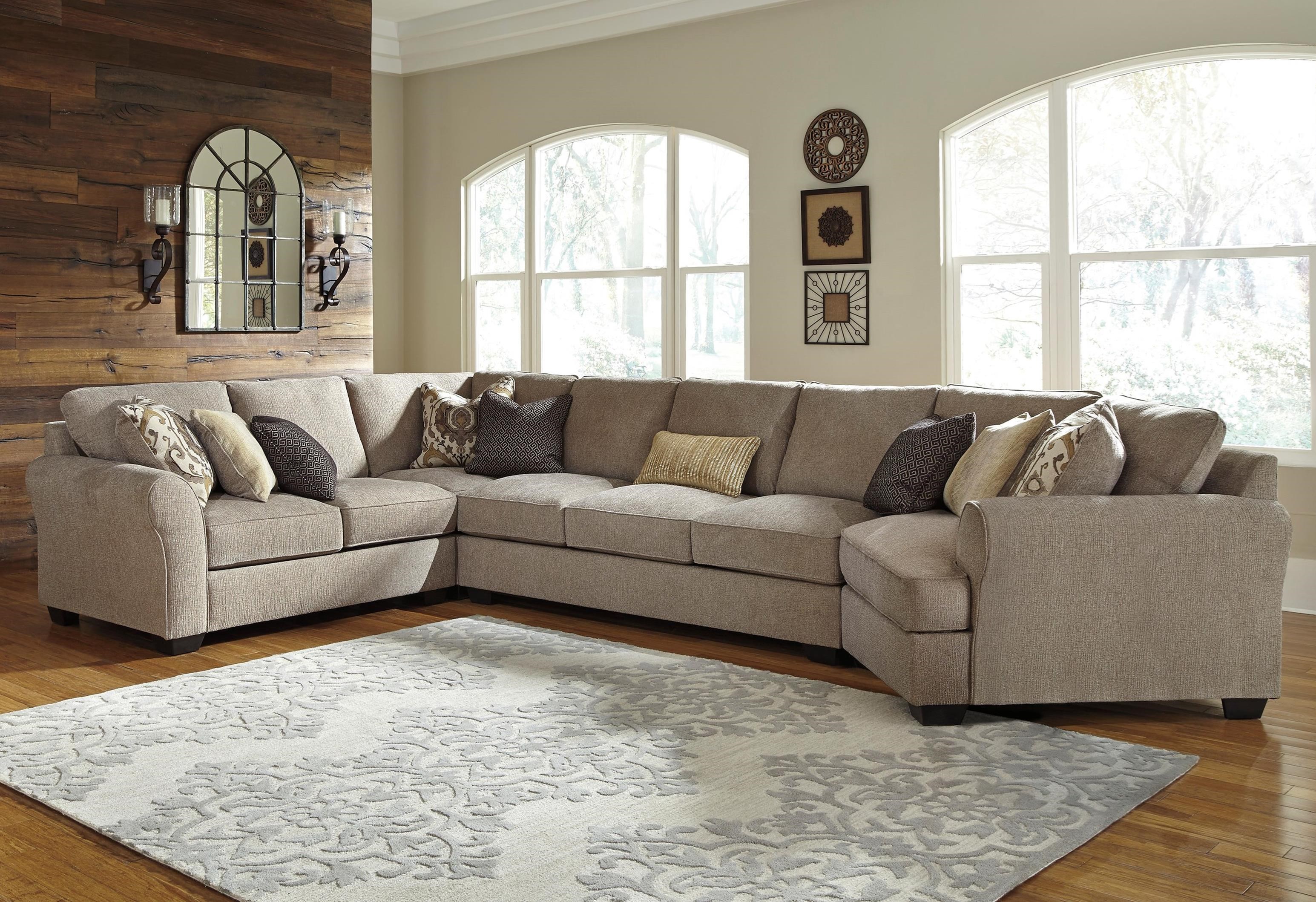 Benchcraft pantomine store driftwood sectional stores