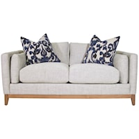 Modern Condo Sofa with Bolster Arm Pillows and Exposed Wood Base Rail