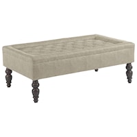 Transitional Ottoman with Tufted Seat and Turned Legs