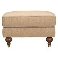 Transitional Raymond Ottoman with Turned Legs and Metal Ferrules