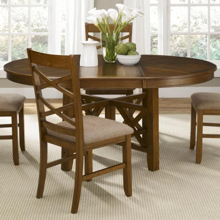 Round-to-Oval Single Pedestal Dining Table with 18-Inch Butterfly Leaf