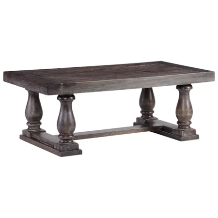 Weathered Finish Farmhouse Style Cocktail Table with Turned Legs and Stretcher