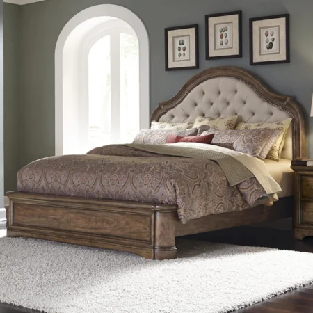 California King Upholstered Bed with Button Tufting and Nailhead Trim