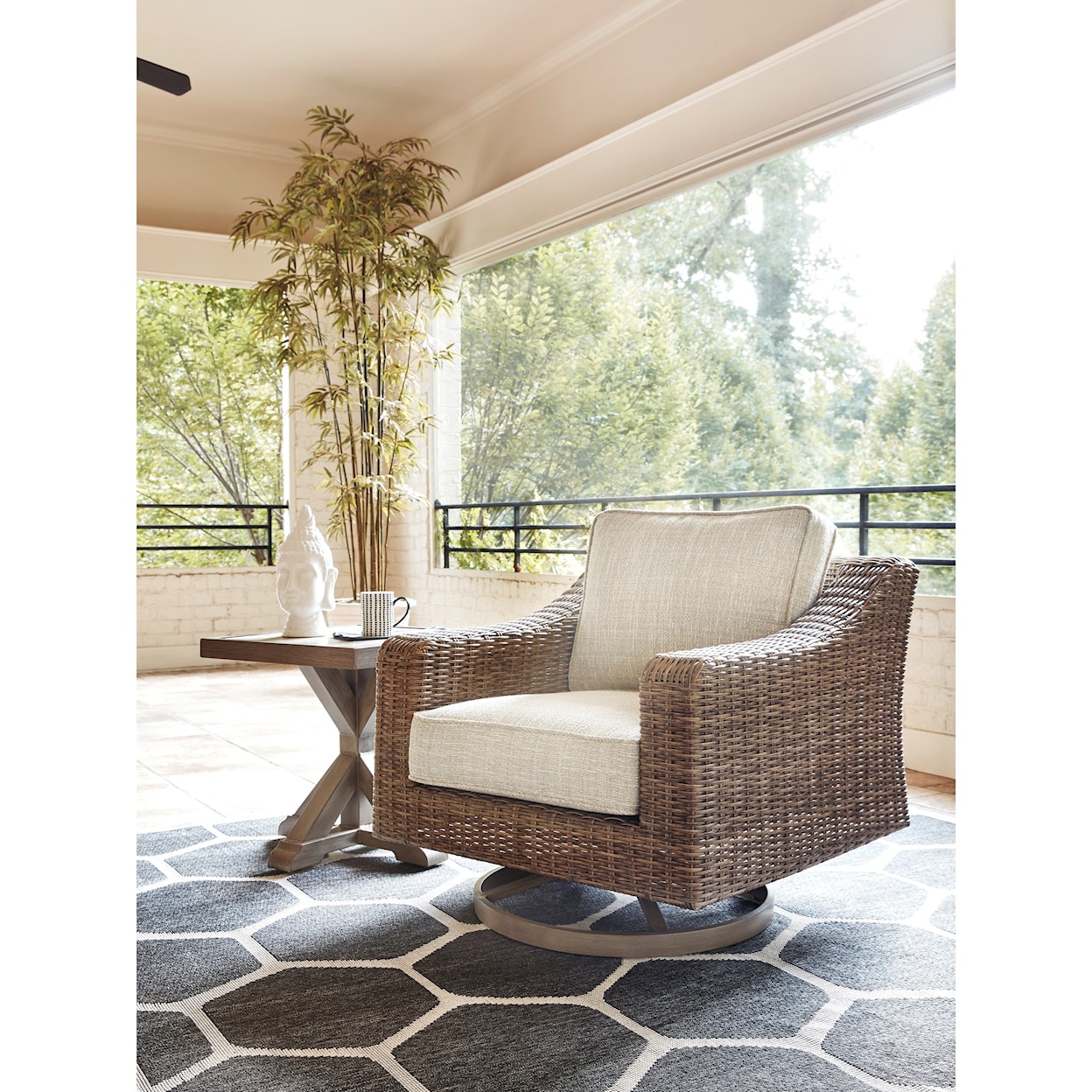 Ashley Furniture Signature Design Beachcroft Swivel Lounge Chair