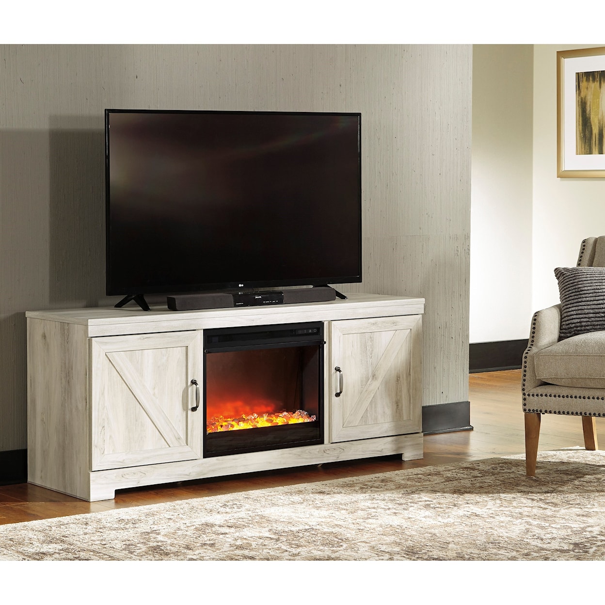 Ashley Furniture Signature Design Bellaby Large TV Stand with Fireplace