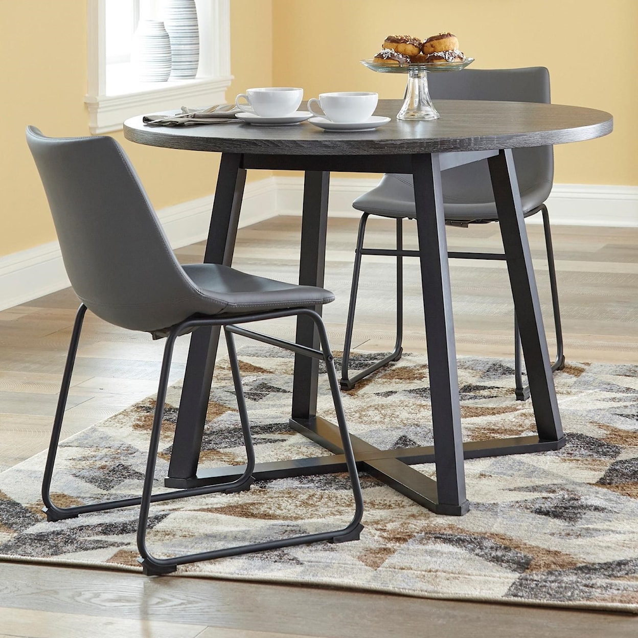 Ashley Signature Design Centiar 3-Piece Round Dining Table Set