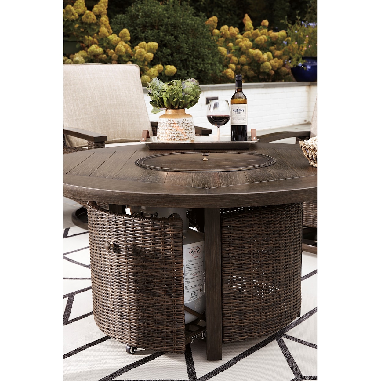 Signature Design by Ashley Paradise Trail Round Fire Pit Table