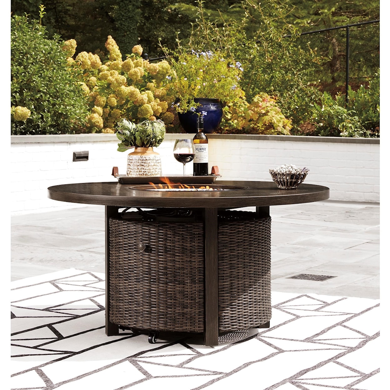 Signature Design by Ashley Paradise Trail Round Fire Pit Table