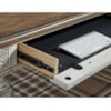 Ashley Furniture Signature Design Realyn L-Shape Desk