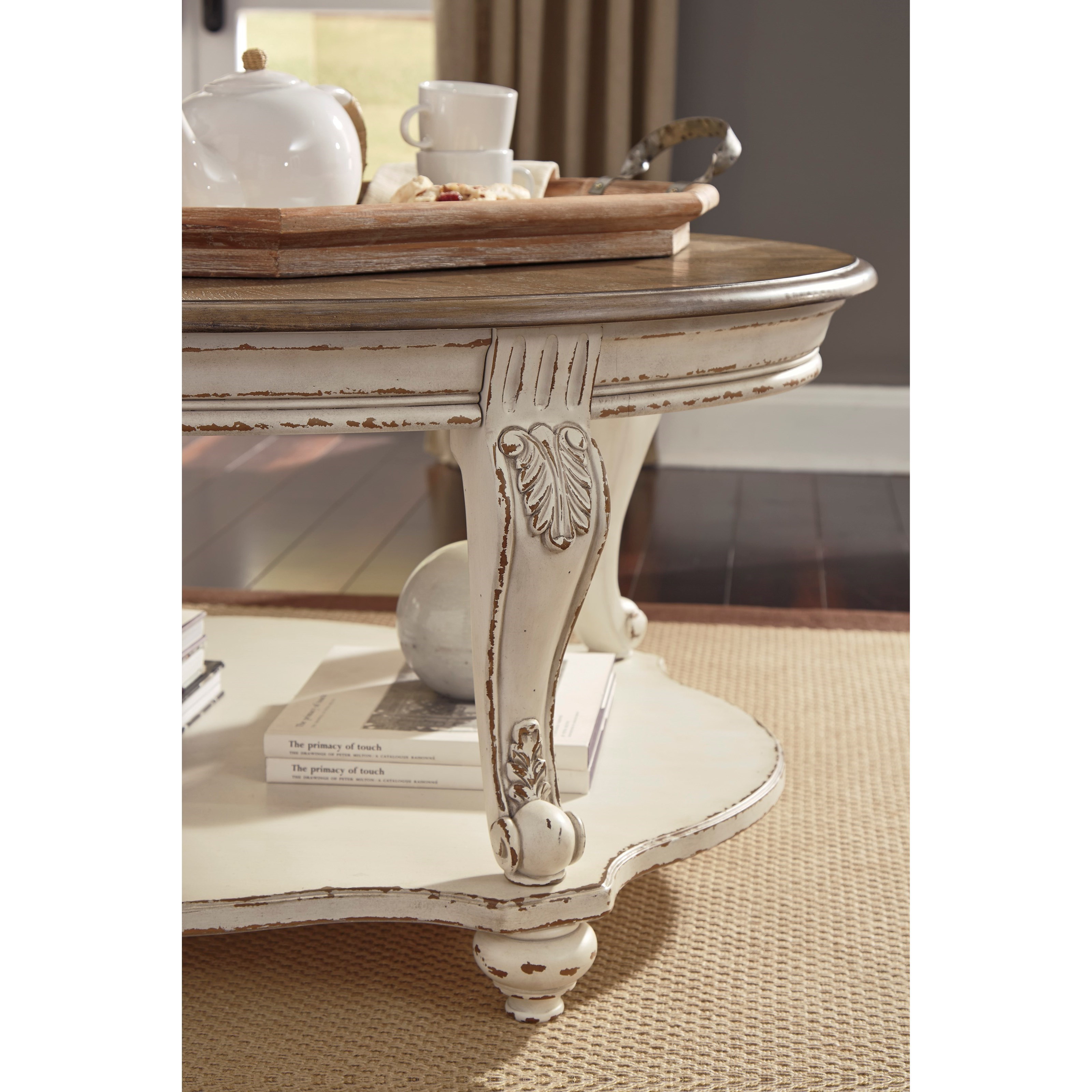 Signature Design by Ashley Realyn FS160 TwoTone Oval Cocktail Table with Bottom Shelf