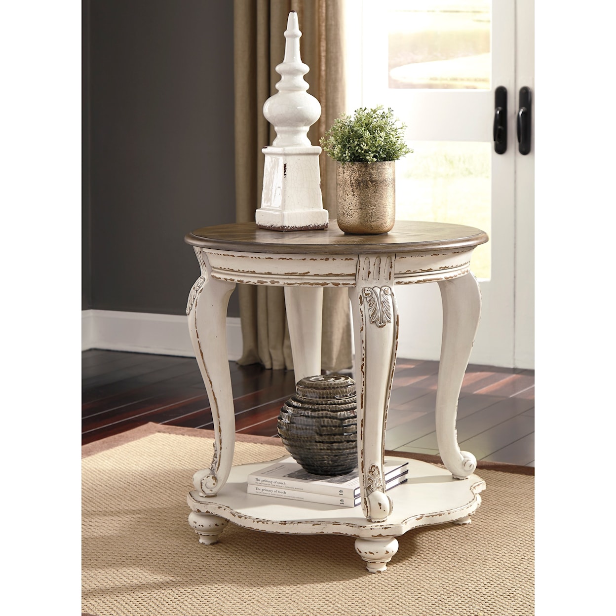 Ashley Furniture Signature Design Realyn Round End Table
