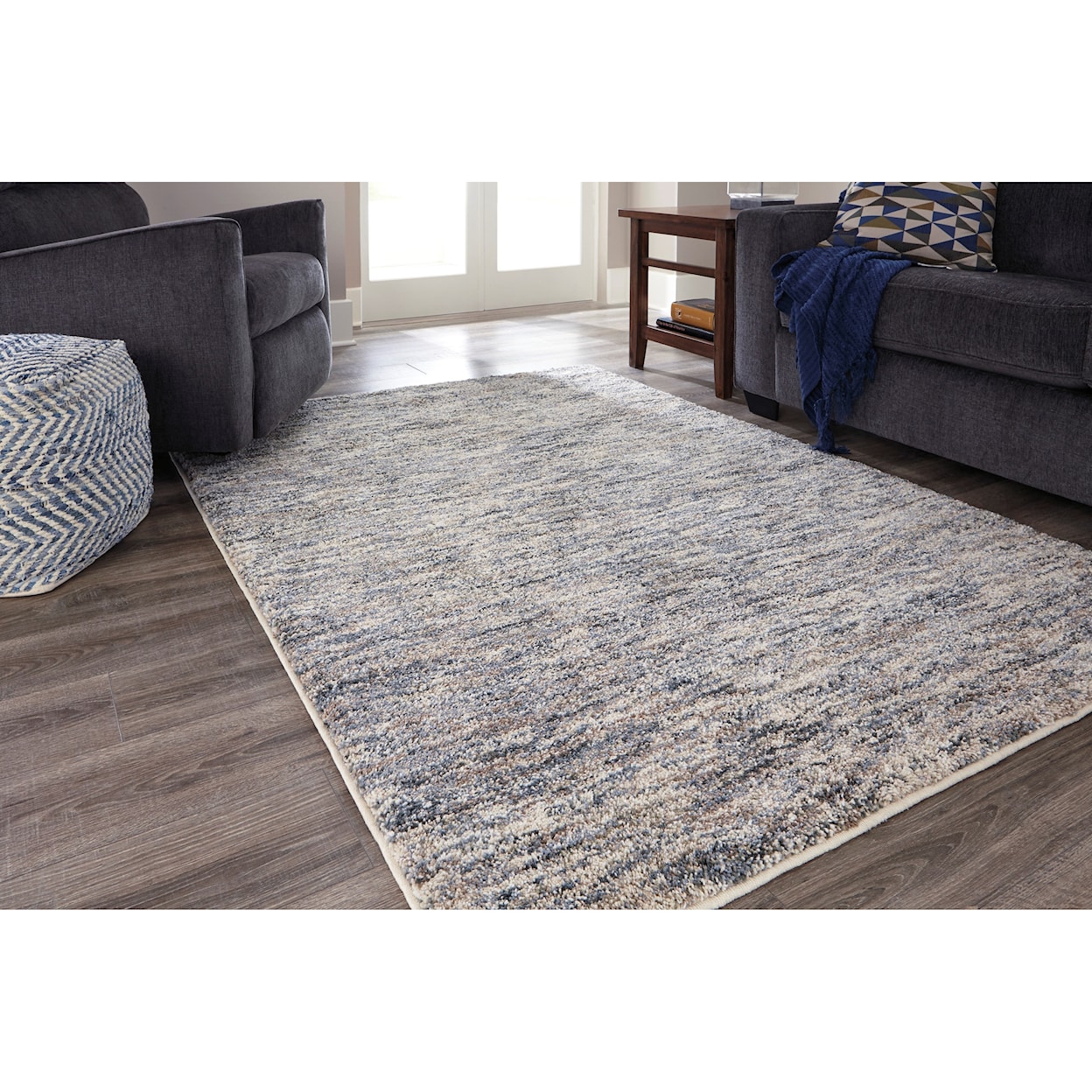 Benchcraft Contemporary Area Rugs Marnin Tan/Blue/Cream Large Rug