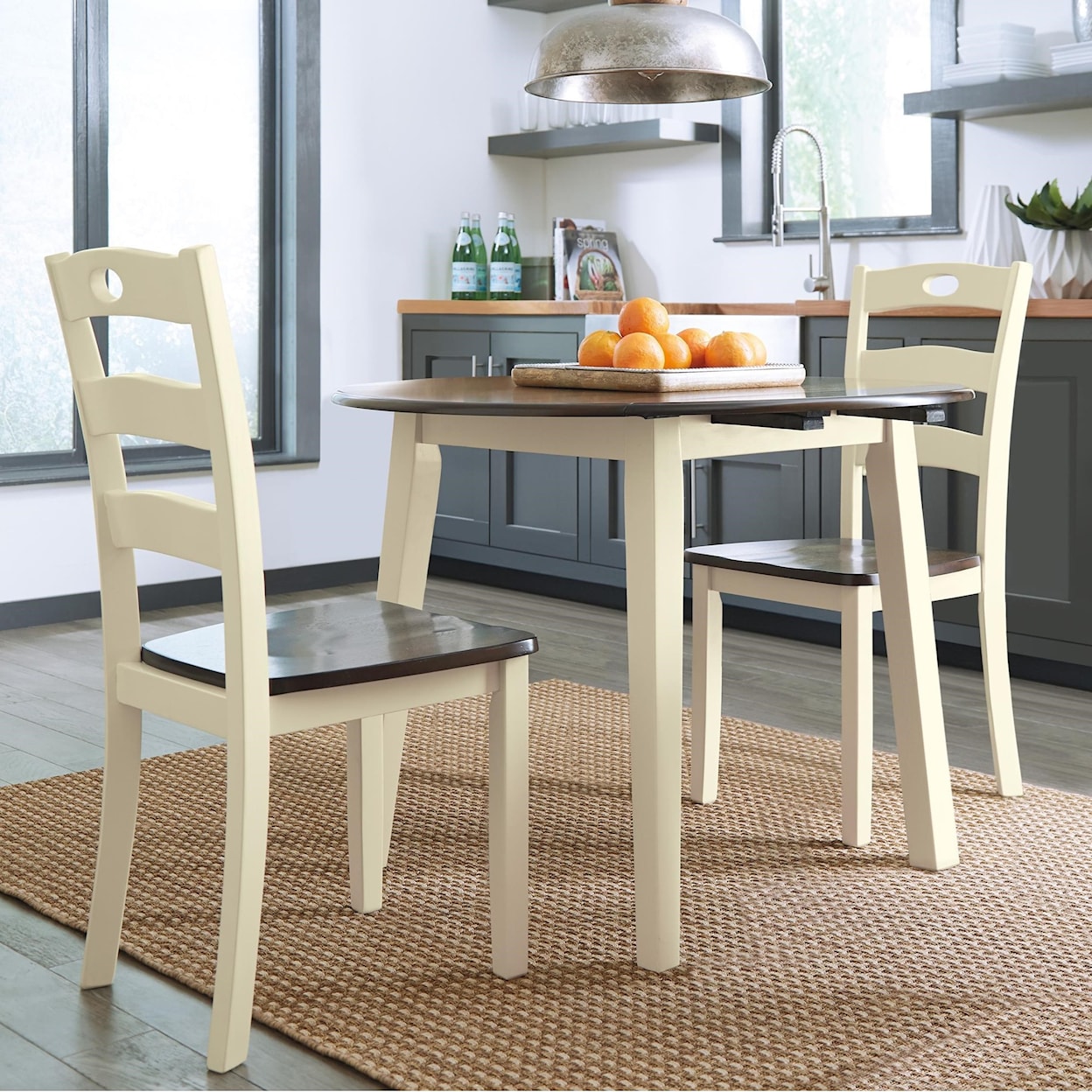 Ashley Furniture Signature Design Woodanville 3-Piece Round Drop Leaf Table Set