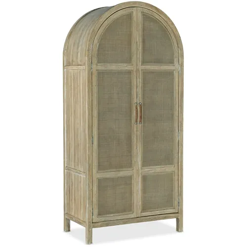 light wood tone arched armoire