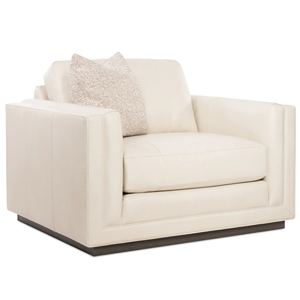 cream chair and a half with throw pillow