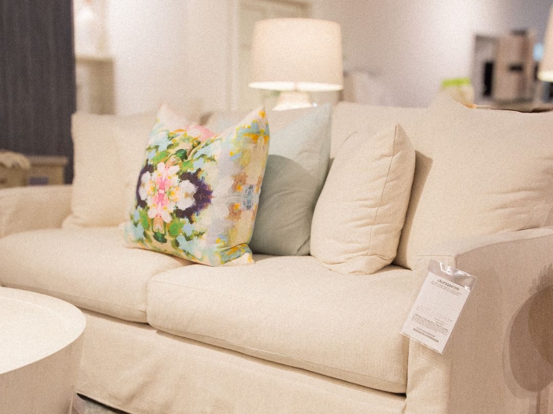 showroom image of sofa with throw pillows