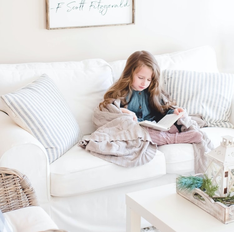 little girl on sofa