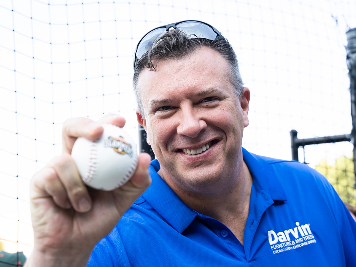2024 Darvin Furniture & Mattress President Will Harris and Darvin associates at Joliet Slammers Ghostbuster Night