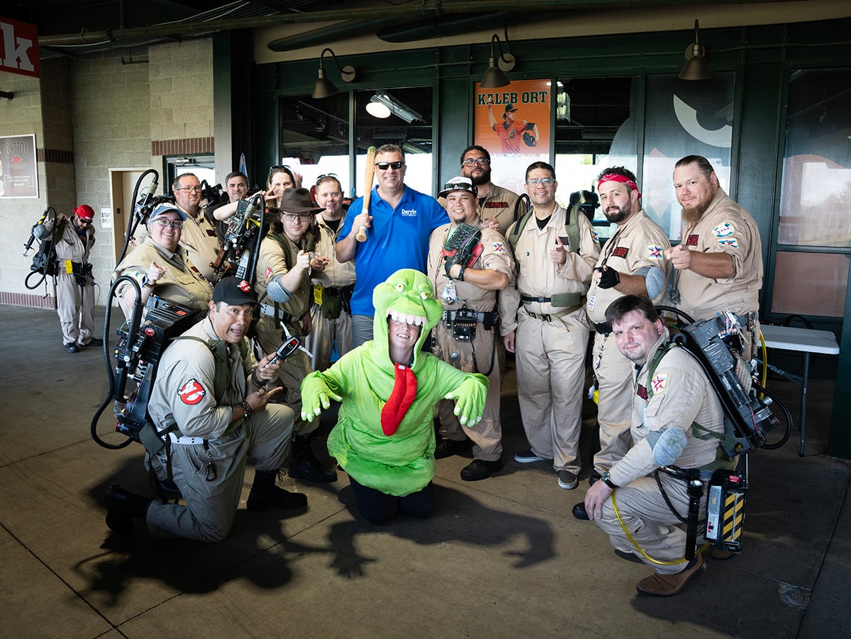 2024 Darvin Furniture & Mattress President Will Harris and Darvin associates at Joliet Slammers Ghostbuster Night