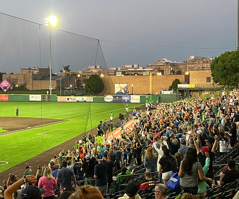 2024 Darvin Furniture & Mattress President Will Harris and Darvin associates at Joliet Slammers Ghostbuster Night