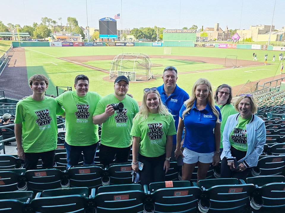 2024 Darvin Furniture & Mattress President Will Harris and Darvin associates at Joliet Slammers Ghostbuster Night