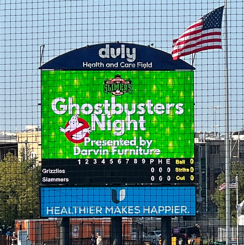 2024 Darvin Furniture & Mattress President Will Harris and Darvin associates at Joliet Slammers Ghostbuster Night