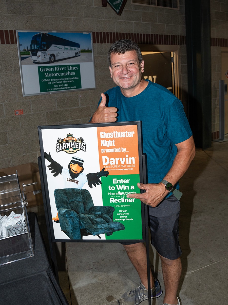2024 Darvin Furniture & Mattress President Will Harris and Darvin associates at Joliet Slammers Ghostbuster Night