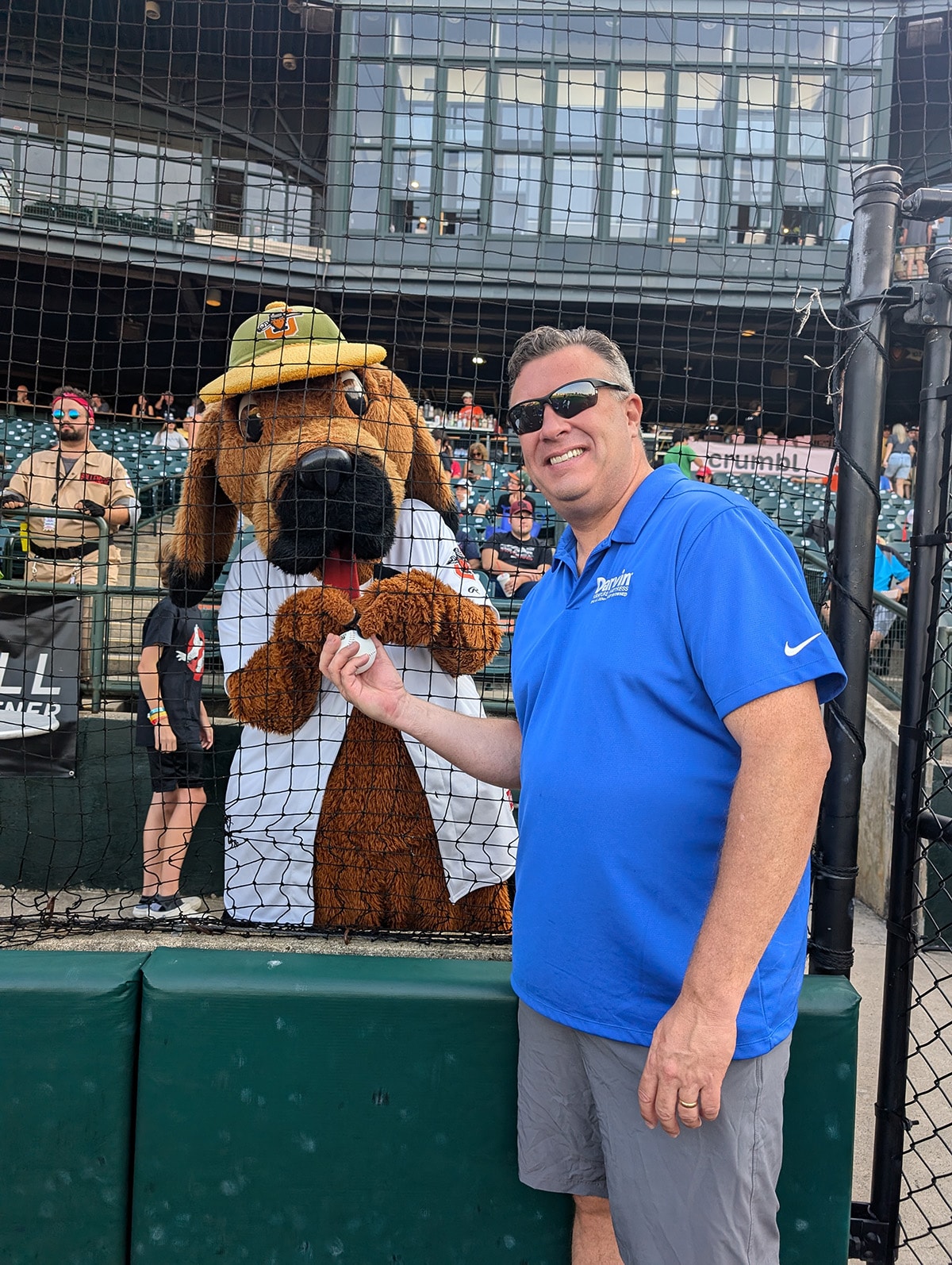 2024 Darvin Furniture & Mattress President Will Harris and Darvin associates at Joliet Slammers Ghostbuster Night