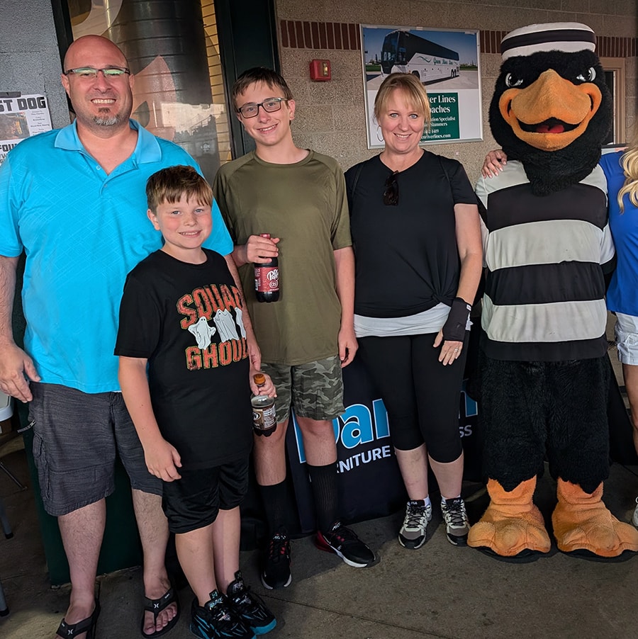 2024 Darvin Furniture & Mattress President Will Harris and Darvin associates at Joliet Slammers Ghostbuster Night