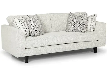 white sofa with black and white pillows