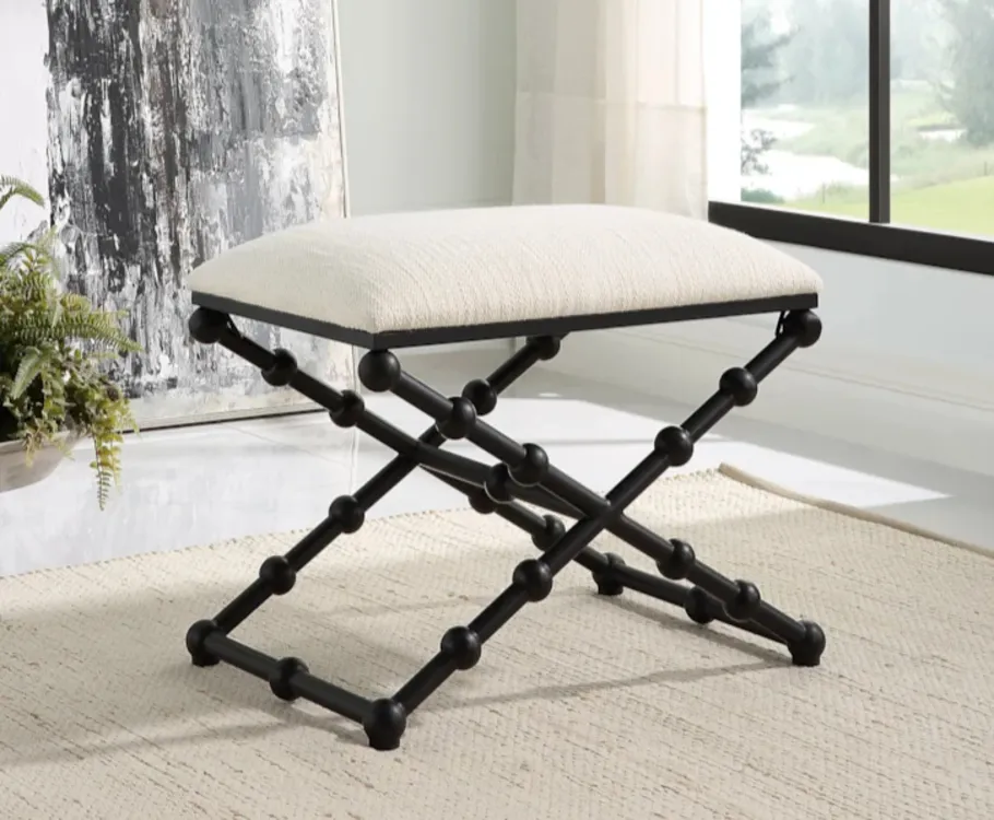 Small bench with iron detailing.