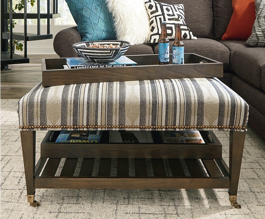 Striped ottoman with added decor