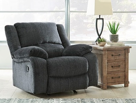 Plush recliner with wooden side table