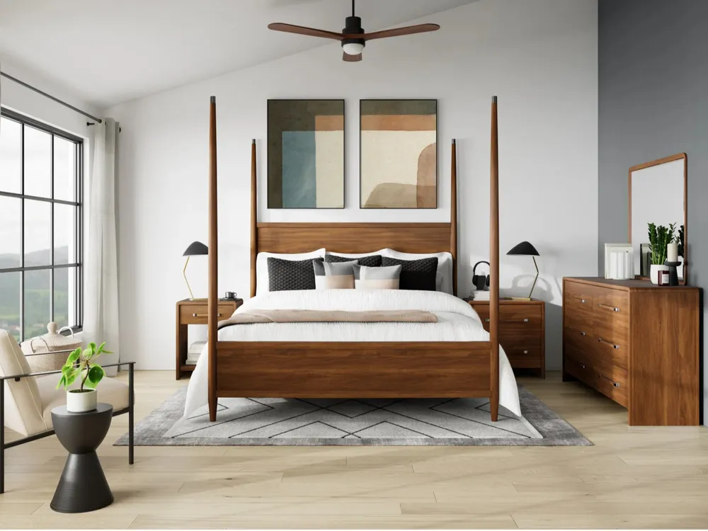 Finished bedroom with matching bed, two nightstands, dresser and other decor