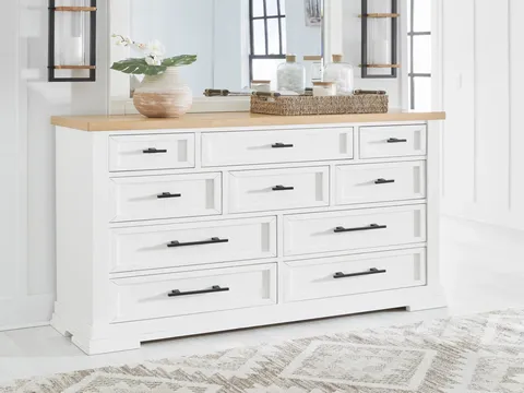 White wooden dresser with ten drawers