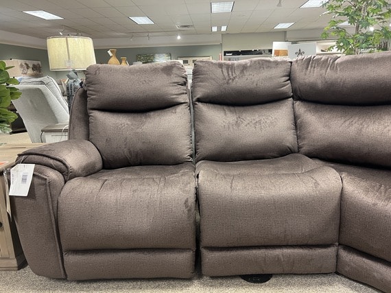 Front view of reclining sofa that is not perfectly aligned