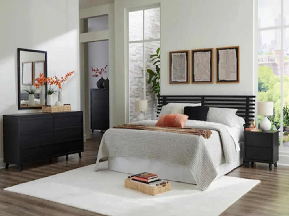 Finished bedroom with 2 matching nightstands and other cohesive decor