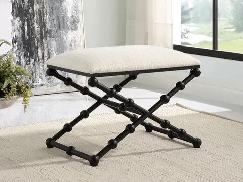 Small bench with iron detailing.