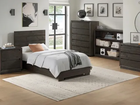 Bedroom set with a nightstand and matching dressers.