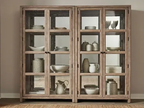 Light wood curio cabinet with glass doors