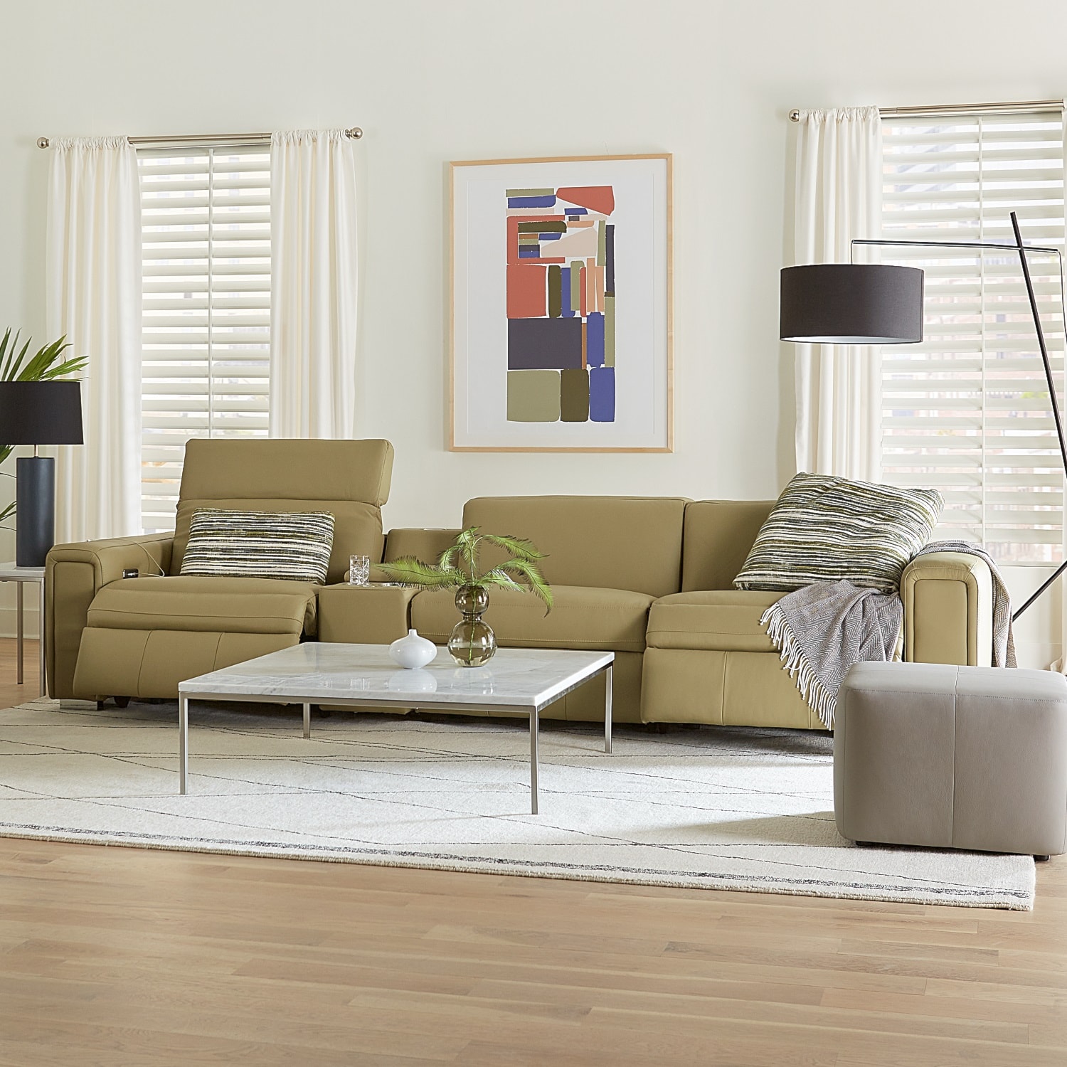 Olive sectional with colourful art