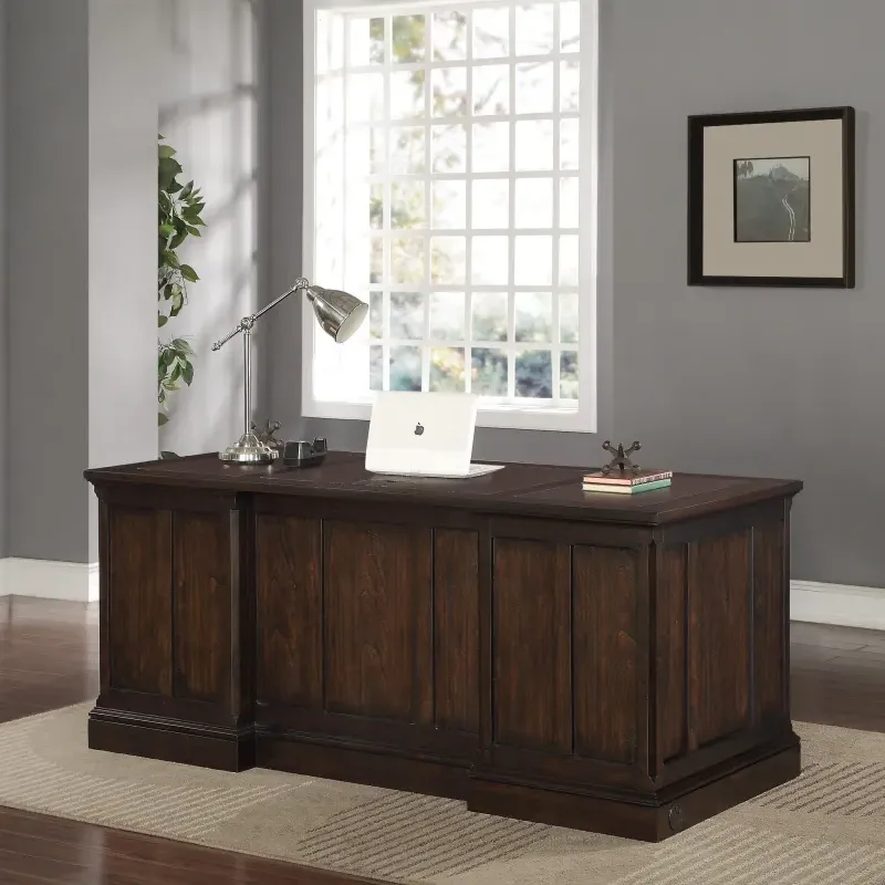Big wood desk with laptop on the top